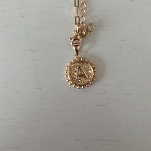 A initial gold chain necklace
